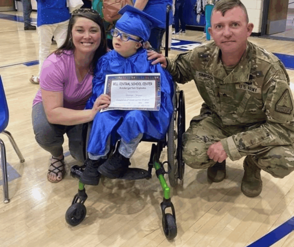 Gunnar who has Trisomy 18 at Kindergarten graduation