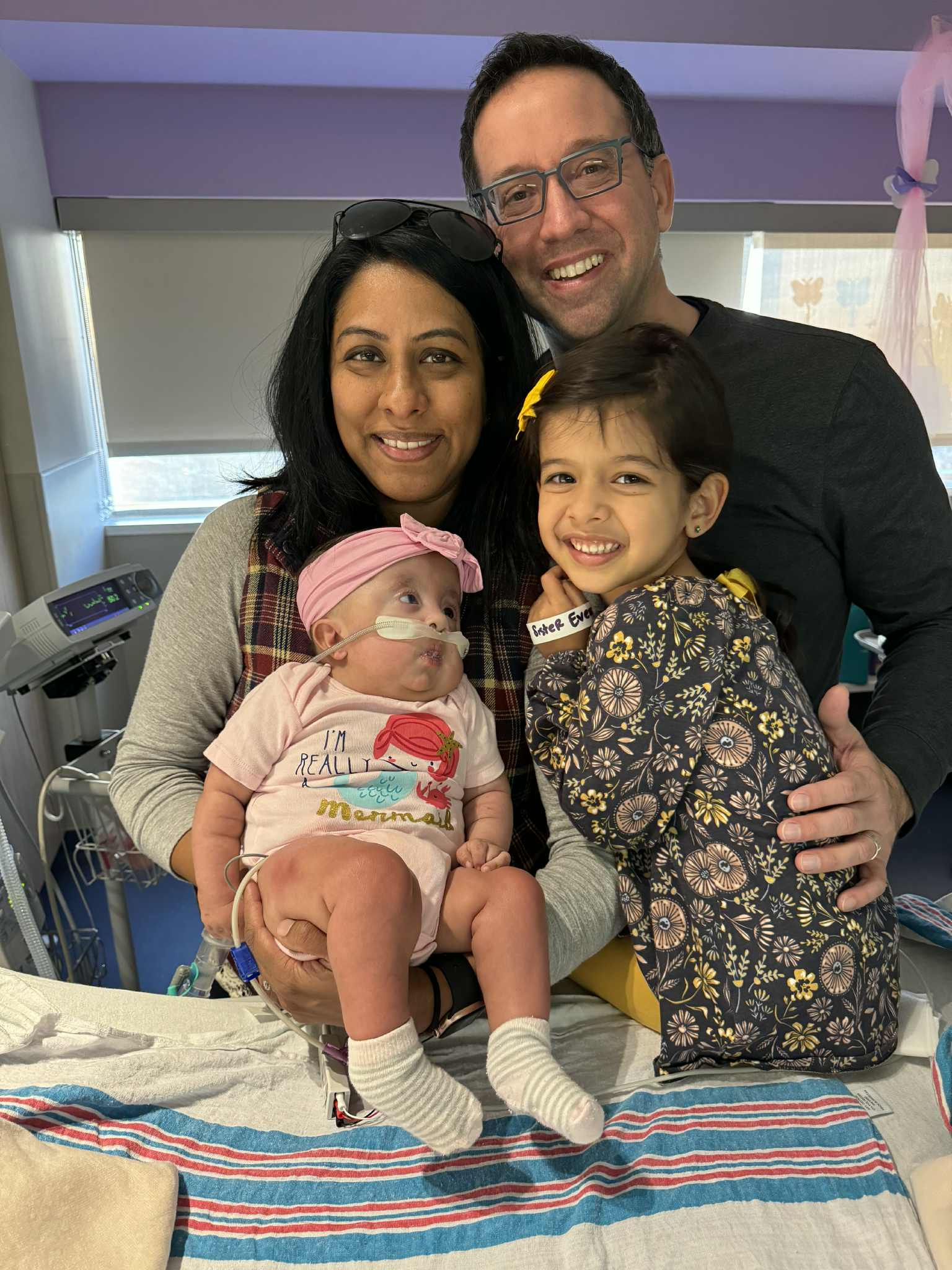 Trisomy 18 baby with family